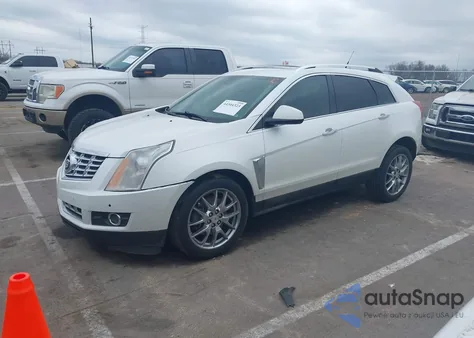2014 Cadillac Srx Premium Collection z USA, uszkodzony, nr VIN 3GYFNDE34ES626960